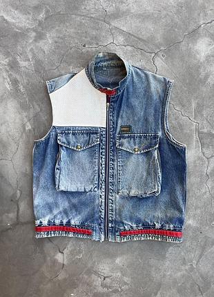 1970s vest on riri zipper: wescot jeans superstar bologna; stonewashed denim w/ inserted leather