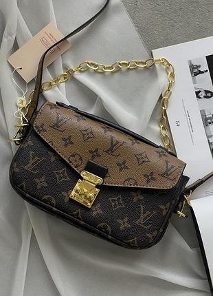 Сумка louis vuitton pochette metis east west monogram моногам є