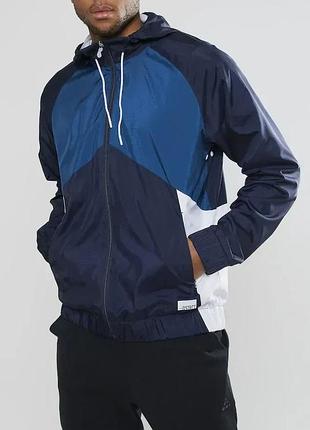 Куртка чоловіча craft district windbreaker man blaze розмір int-m