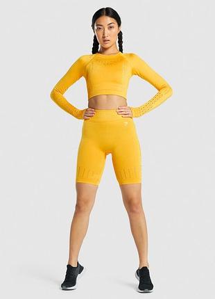 Gymshark glow яркие бесшовные спортивные шорты велосипедки
teveo nike puma lululemon alo yoga oysho prozis smilodox oace