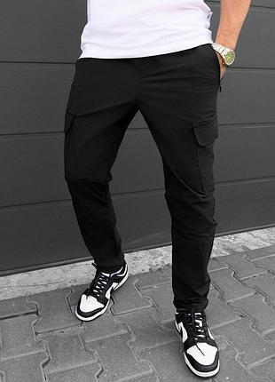 Штани з накладними кишенями staff cargo tam black