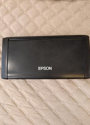 Портативний струменевий принтер epson workforce wf-100w, призначений для мобільного використання.