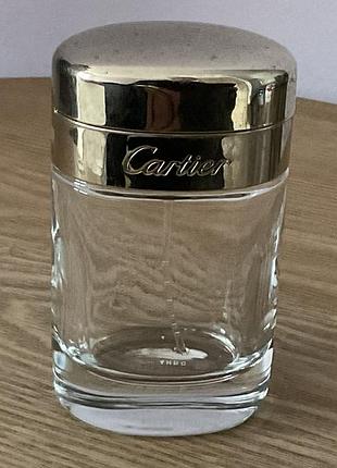 Флакон с остатками парфюма “cartier”.
