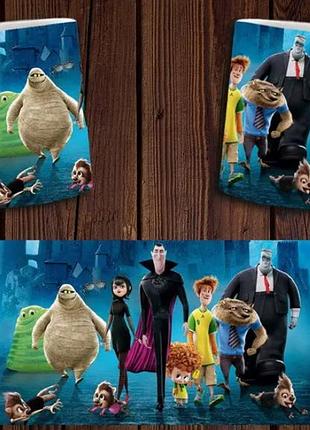 Чашка біла керамічна "монстри на канікулах" hotel transylvania abc