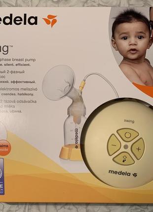 Двофазний електричний молоковідсмоктувач medela swing + соска4 фото