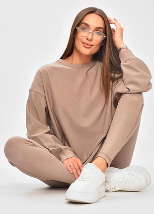Костюм жіночий однотонний бежевого кольору. р.l 205769k