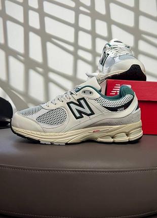 New balance 2002r pouch beige green