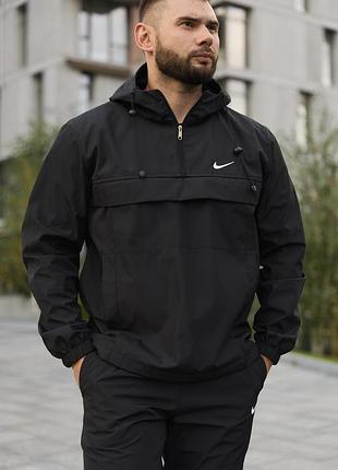 Демисезонный мужской анорак nike president чёрного цвета без принтов, с регулируемым капюшоном и карманами xl