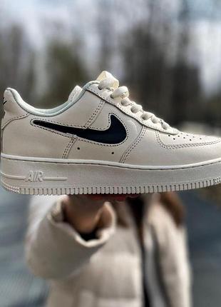 Жіночі кросівки nike air force 1 low білі шкіряні стильні зручні для жінок повсякденні найк