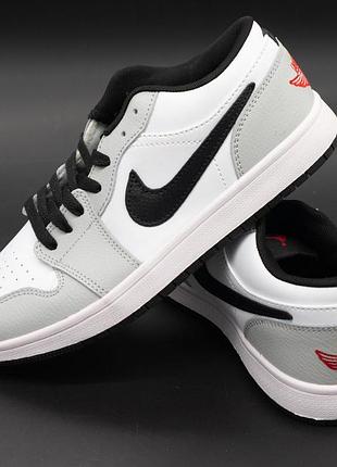 Низкие серые с черным кроссовки nike air jordan 1. топ качество! 40. размеры в наличии: 36, 37, 38, 39, 40,