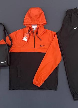 Спортивный мужской ветрозащитный костюм nike, оранжево-чёрный анорак с капюшоном и карманами, чёрные штаны с манжетами xxl