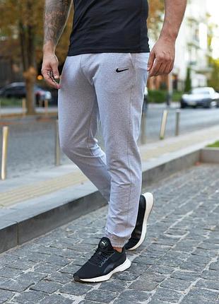 Трикотажные мужские демисезонные штаны серые с логотипом nike, спортивные штаны прямые на манжетах с карманами l