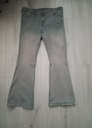 Голубые flared jeans