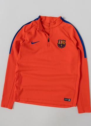 Спортивний, тренувальний верх nike x fc barcelona у яскравому, червоно-помаранчевому кольорі. модель прикрашена емблемою футбольного клубу «барселона