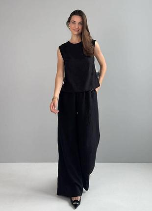 Жіночі лляні штани палаццо, якісні літні штани вільного крою з льону 44-50 розміри чорні 46