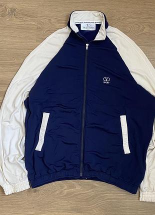 Вінтажна олімпійка valentino sport у темно-синьому та білому кольорах.
