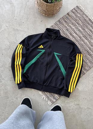 Вінтажна чорна спортивна кофта adidas з жовтими смужками й зеленими елементами у вантажному стилі