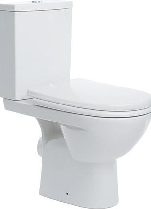 Status унитаз-компакт напольный, косой выпуск, смывной бачок 3/6 л, подвод воды снизу, сиденье с крышкой полипропилен sandwich