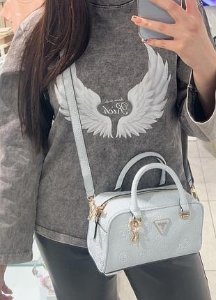 Жіноча блакитна сумка guess з візерунком