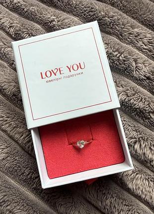 Золотое кольцо love you с топазом