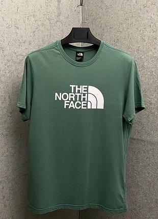 Зелена футболка від бренду the north face