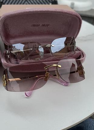 Сонцезахисні окуляри miumiu