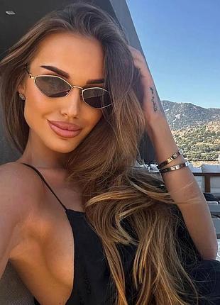 Сонцезахисні окуляри miumiu