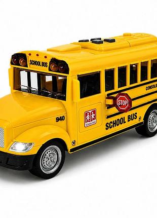 Іграшковий шкільний автобус school bus зі світлом і звуком, інерційний 20 см, масштаб 1:20, відкривні двері, арт. wy940a