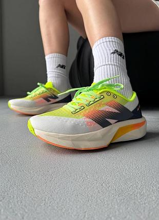 Женские летние кроссовки new balance fuelcell rebel v4 lime/orange