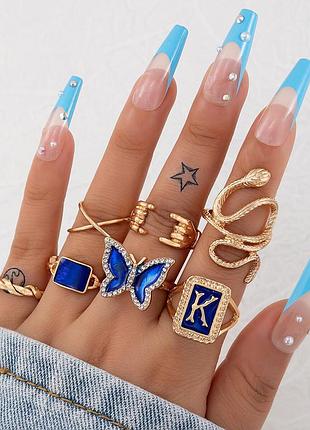 Комплект з 7 золотистих каблучок