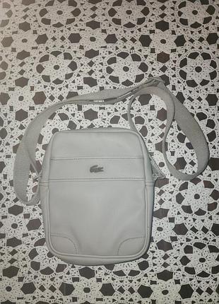 Унисекс серая сумка lacoste через плечо.