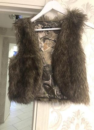 Меховой жилет