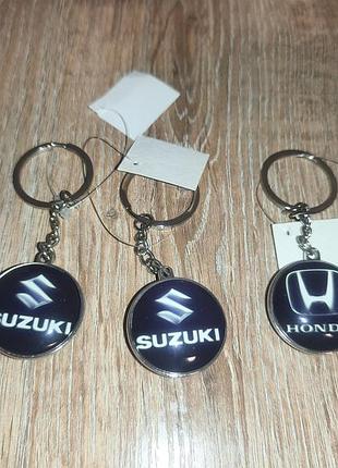 Продам автомобильные брелоки hoda, suzuki
