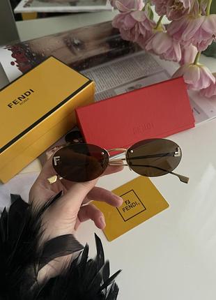 Сонцезахисні окуляри fe4075us 6lb/ic brown/gold💛