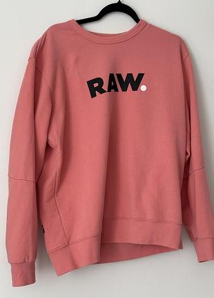 Рожевий світшот від бренду g-star raw з великим чорним логотипом "raw" на грудях