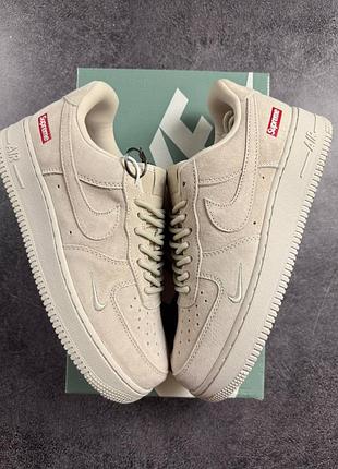 Nike air force 1 low x supreme beige