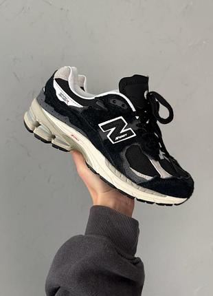 Чёрные кроссовки унисекс new balance 2002r protection pack black grey х нью беланс 40