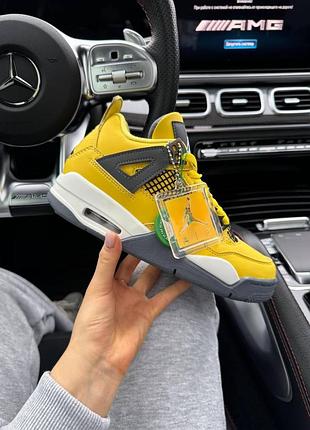Жовті кросівки унісекс nike air jordan 4 retro tour yellow х джордан 42