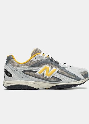 Сірі жіночі кросівки new balance 204l grey yellow х нью беланс 36