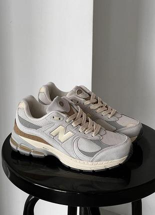 Серые кроссовки унисекс new balance 2002r grey beige х нью беланс 37