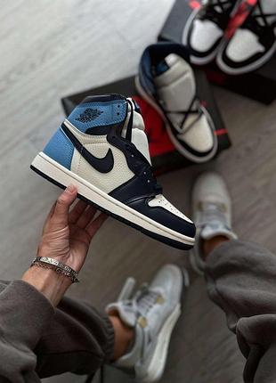 Жіночі біло-блакитні кросівки nike jordan 1 retro high obsidian unc х джордан 41