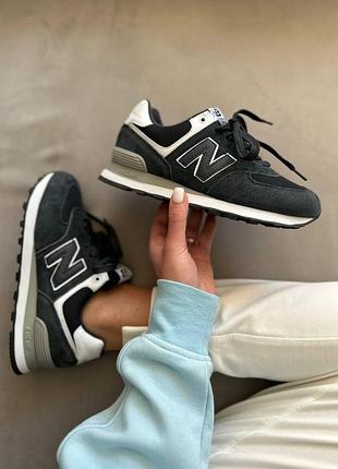 Легкі жіночі кросівки new balance 574 сірого відтінку із замші, сучасний дизайн