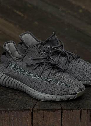 Жіночі кросівки adidas yeezy boost чорні легкі тканинні з унікальним дизайном ізіки для жінок адідас