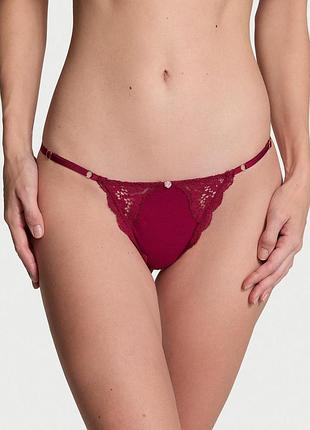 Жіночі трусики victoria secret (34312955164373) lace-trim adjustable v-string panty m бордові
