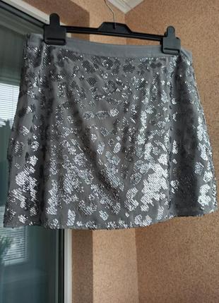 Красивая стильная юбка мини в пайетки1 фото