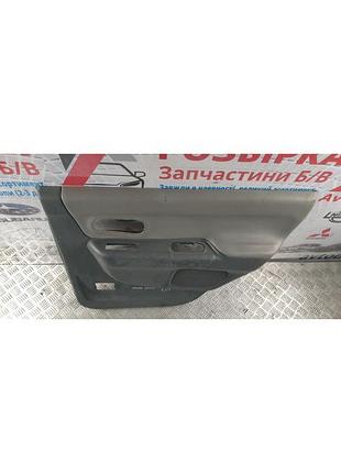 Панель обшивки задніх дверей права mr572347 mitsubishi pajero/montero sport
