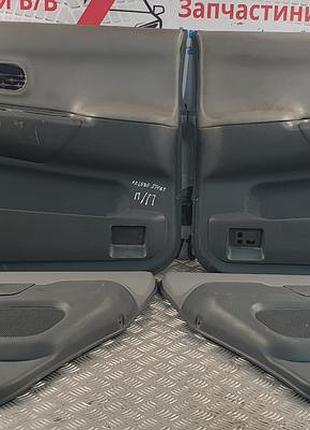 Панель обшивки задніх дверей ліва mr651484 mitsubishi pajero/montero sport