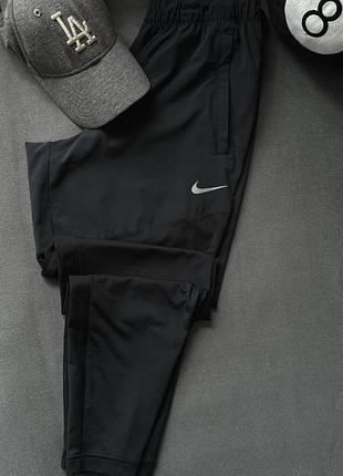 Nike спортивні штани для бігу для спорту нейлонові штани лосини