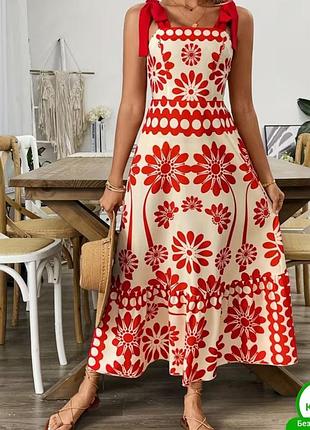 Довгий літній сарафан у богемному стилі (boho), який вирізняється яскравим червоно-білим квітковим принтом. shein