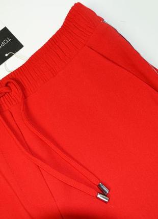 Нові щільні червоні штани з лампасами5 фото